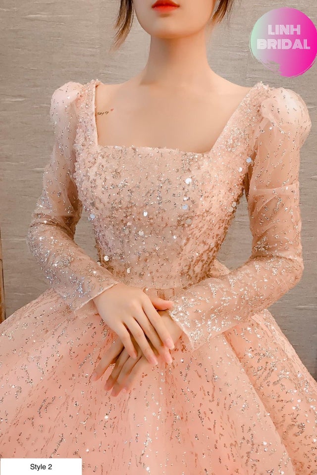 Light pink sparkle long sleeves ball gown wedding dress with glitter