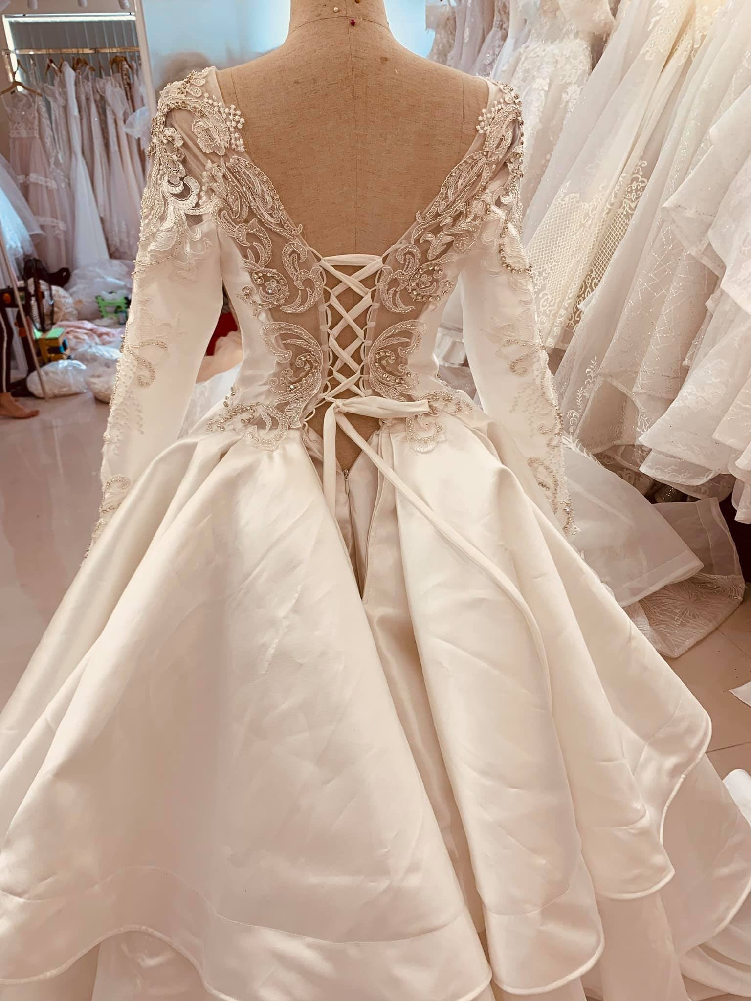 Beautiful royal vintage inspired white satin wedding dress