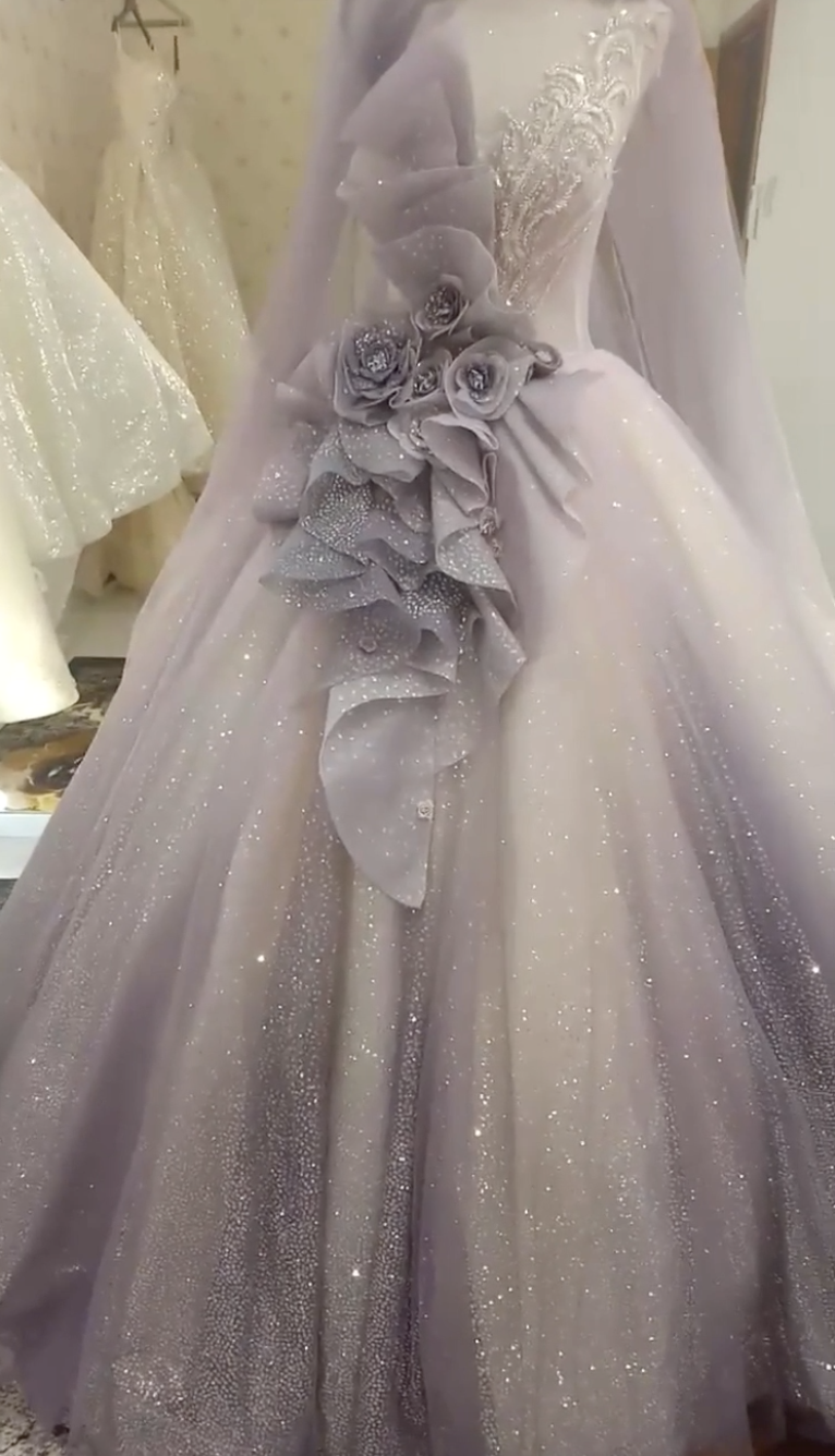 Dramatic purple sparkly ballgown wedding dress with big
