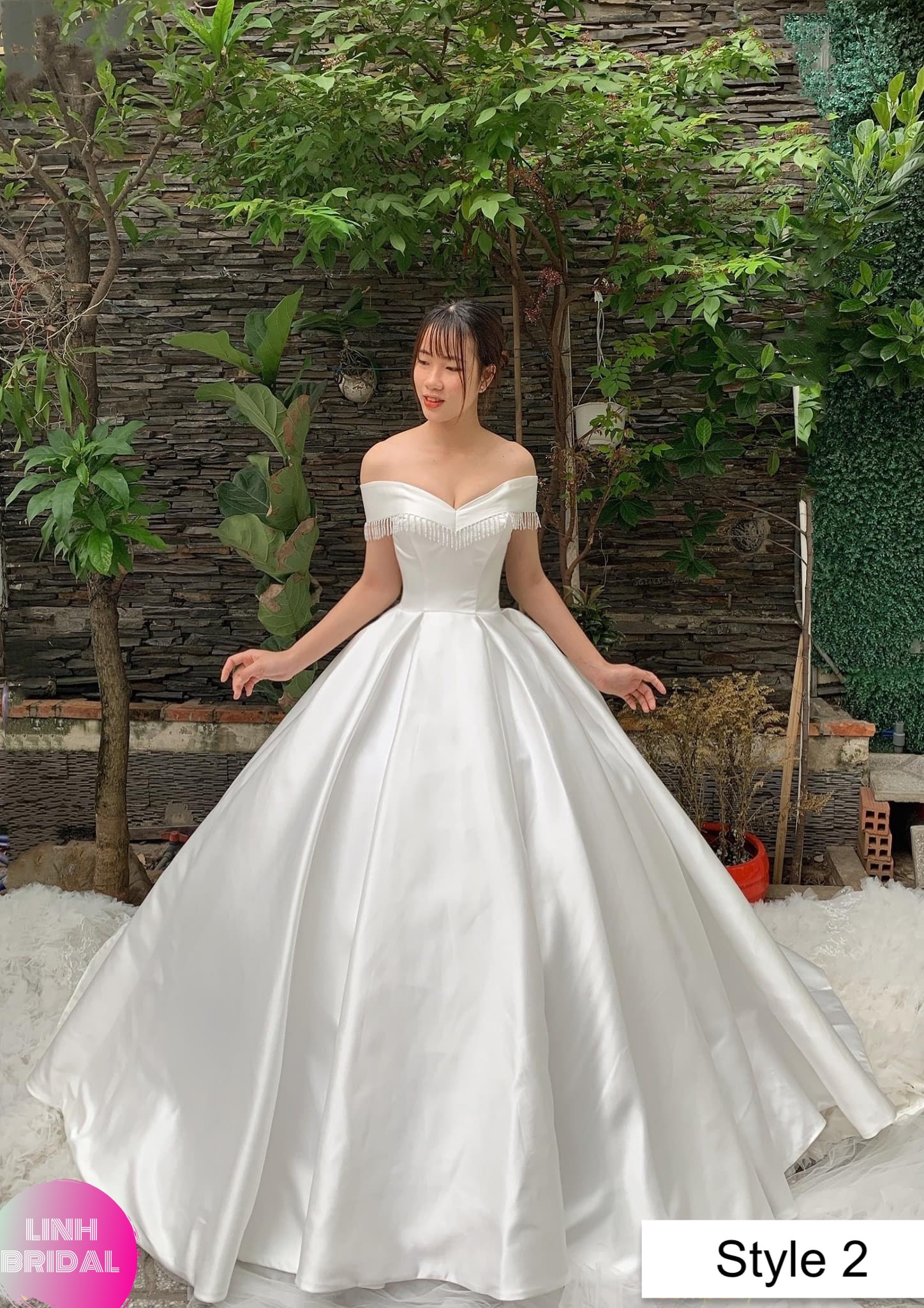 Minimalist white plain off the shoulder satin ball gown wedding dress