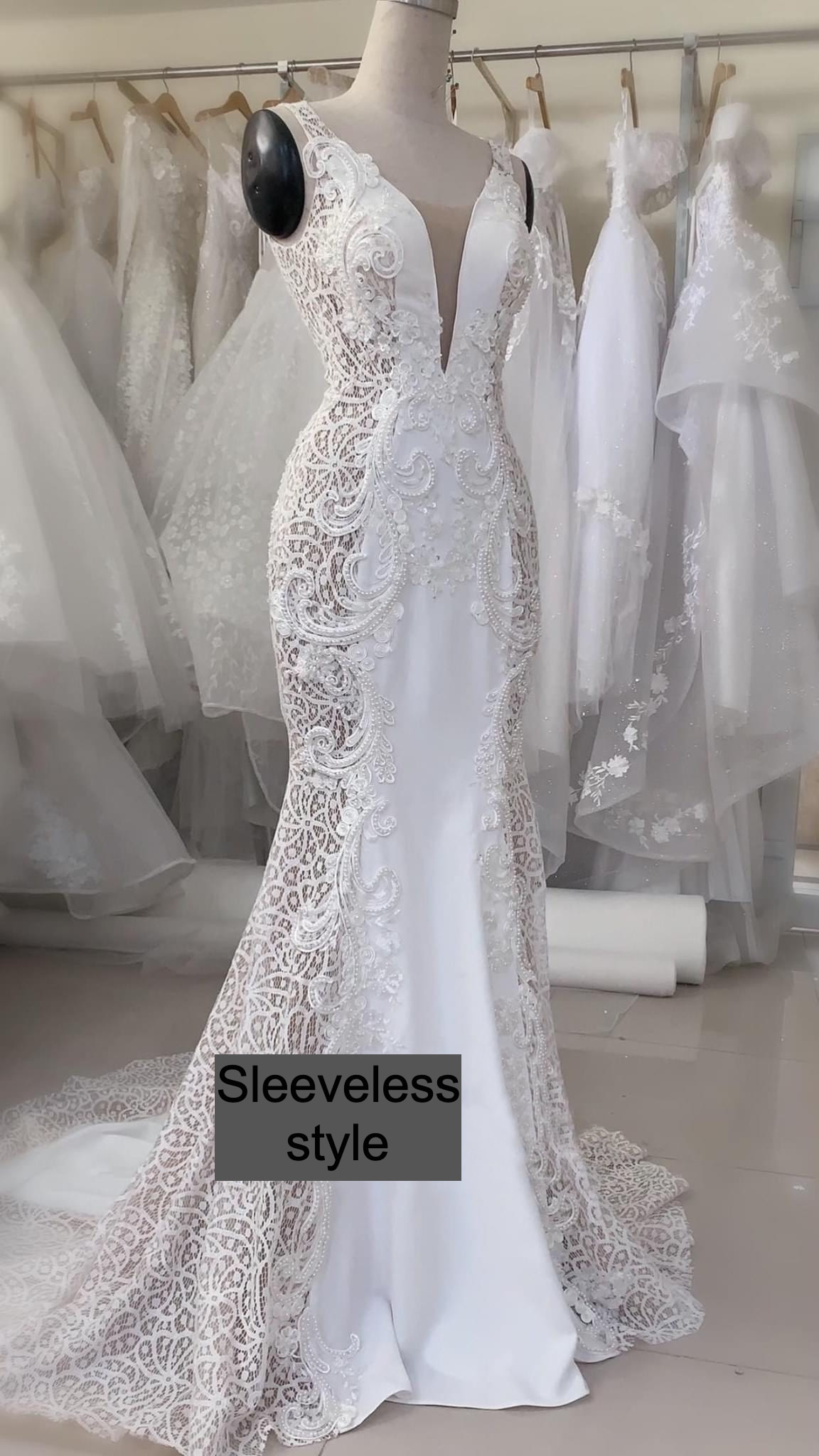 Alluring deep V neck sleeveless white mermaid wedding dress with