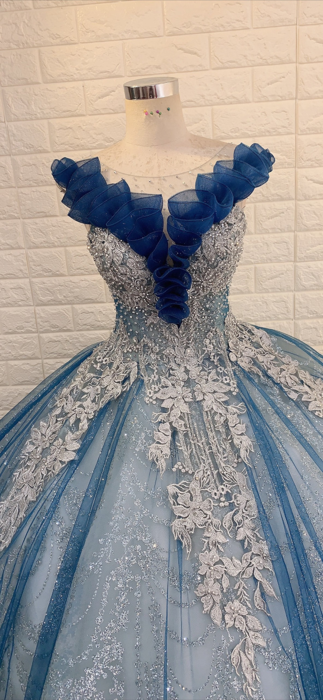 Blue ruffled neck sleeveless sparkle ball gown wedding/prom dress with ...