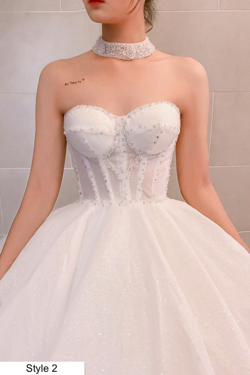 Off the shoulder corset top white sparkle ballgown wedding dress