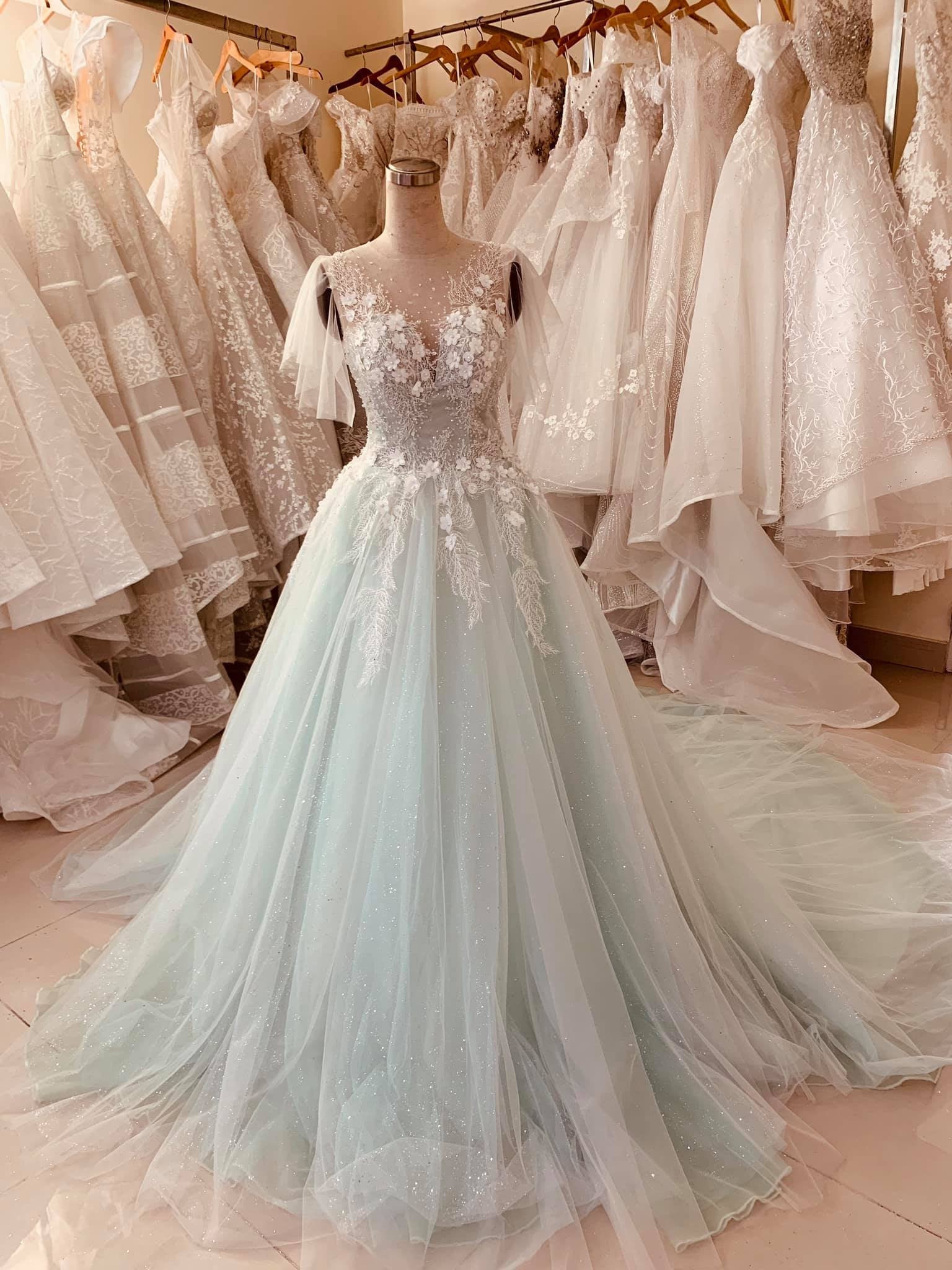 Pastel mint green floral lace flutter sleeve ball gown
